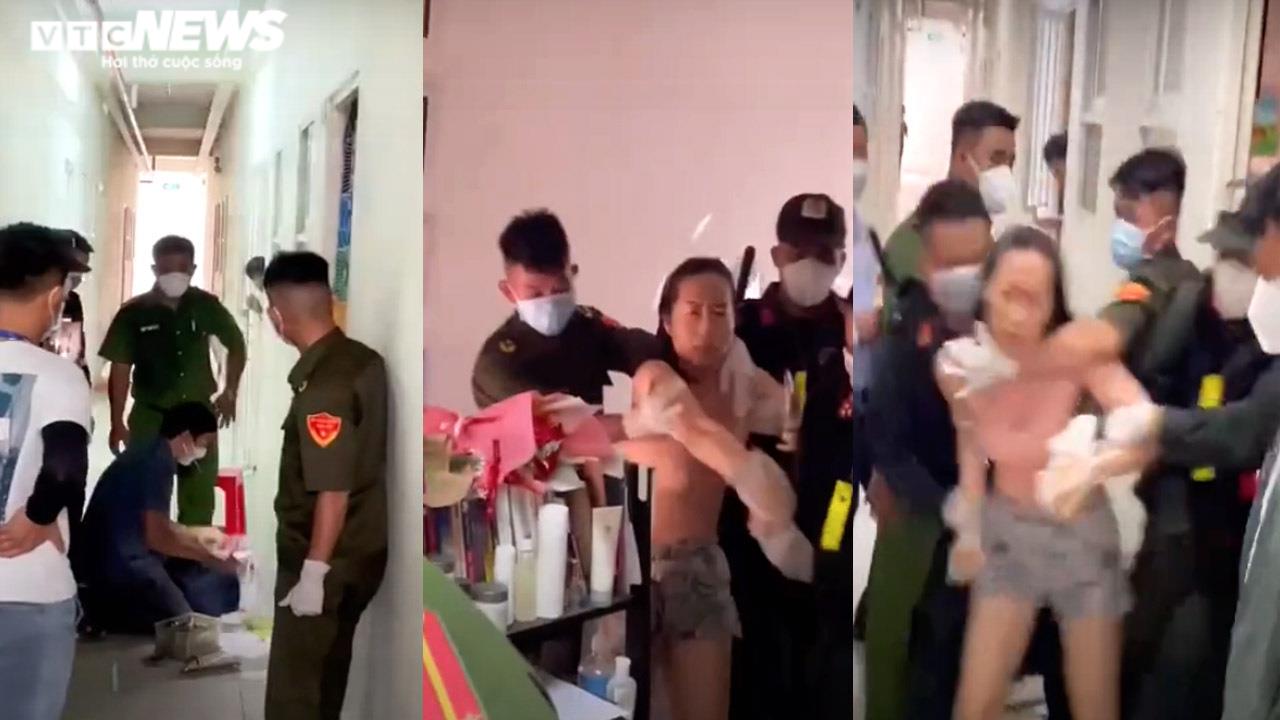 Cảnh cưỡng chế xét nghiệm ở Bình Dương, tháng 9/2021. Ảnh: VTC.